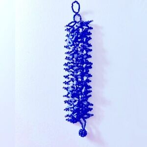 Artisan bracelet w  Sodalite Stones, woven into Peacock Seed beads 6.75-7.5”